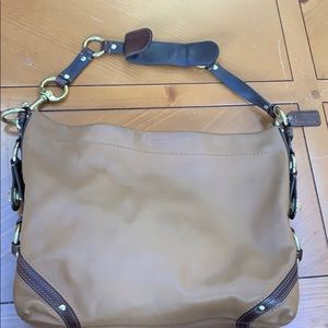 Brown leather females coach handbag